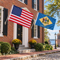 Heavy Duty American Flag and Delaware State Flag 3x5 2-Pack displayed outdoors