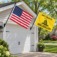 Heavy Duty American Flag and Don't Tread on Michigan Flag 3x5 2-Pack displayed outdoors