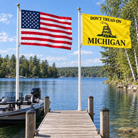 Heavy Duty American Flag and Don't Tread on Michigan Flag 3x5 2-Pack displayed outdoors