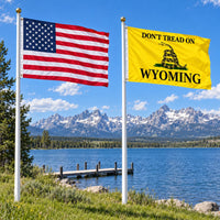 Heavy Duty American Flag and Don't Tread on Wyoming Flag 3x5 2-Pack displayed outdoors
