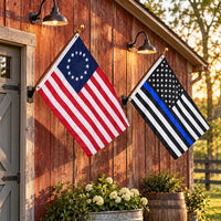 Betsy Ross and Thin Blue Line Flags 3x5 2-Pack displayed outdoors