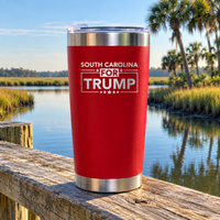 South Carolina red 20oz tumbler on a dock railing (lifestyle)