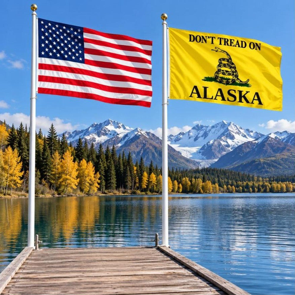 American flag and Don't Tread on Alaska flag flying side by side outdoors