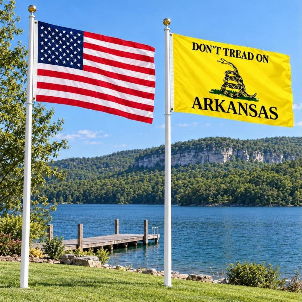 American flag and Don't Tread on Arkansas flag flying side by side outdoors