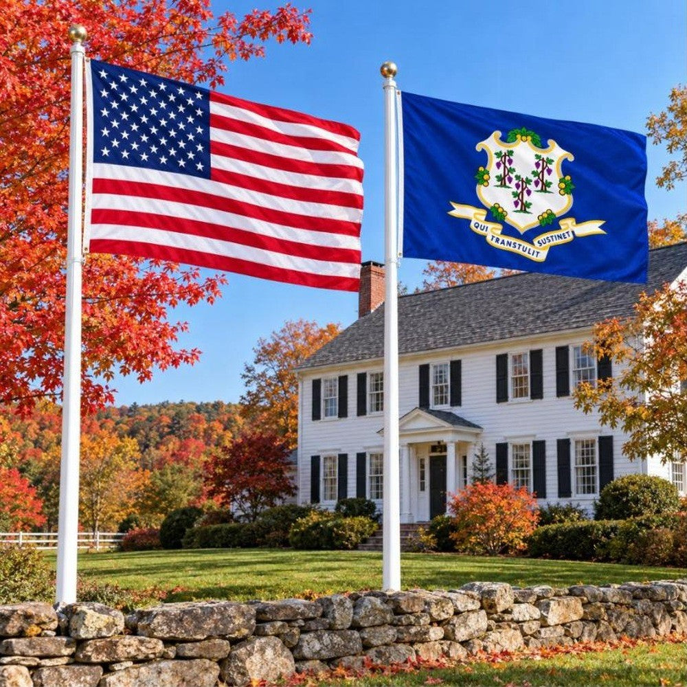 American flag and Connecticut State Flag flying side by side outdoors