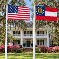 American flag and Georgia State Flag flying side by side outdoors