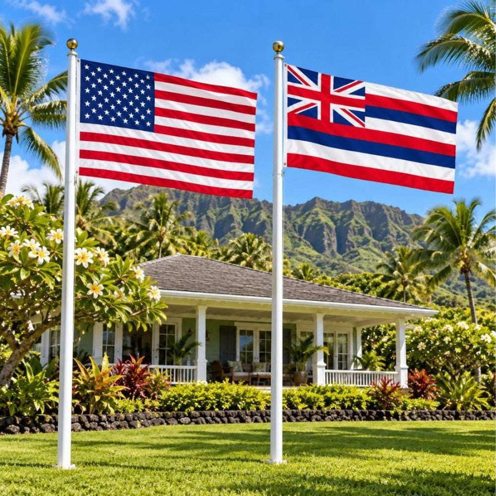 American flag and Hawaii State Flag flying side by side outdoors