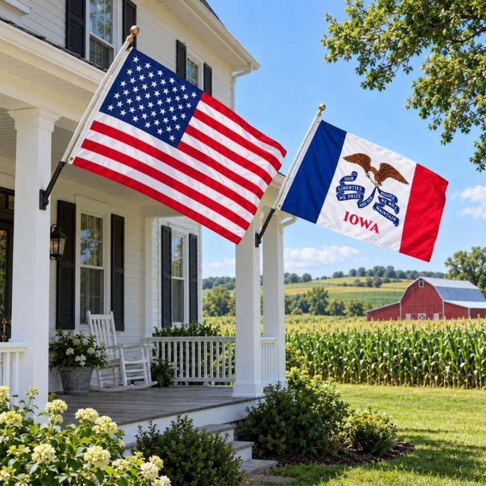 American flag and Iowa State Flag flying side by side outdoors