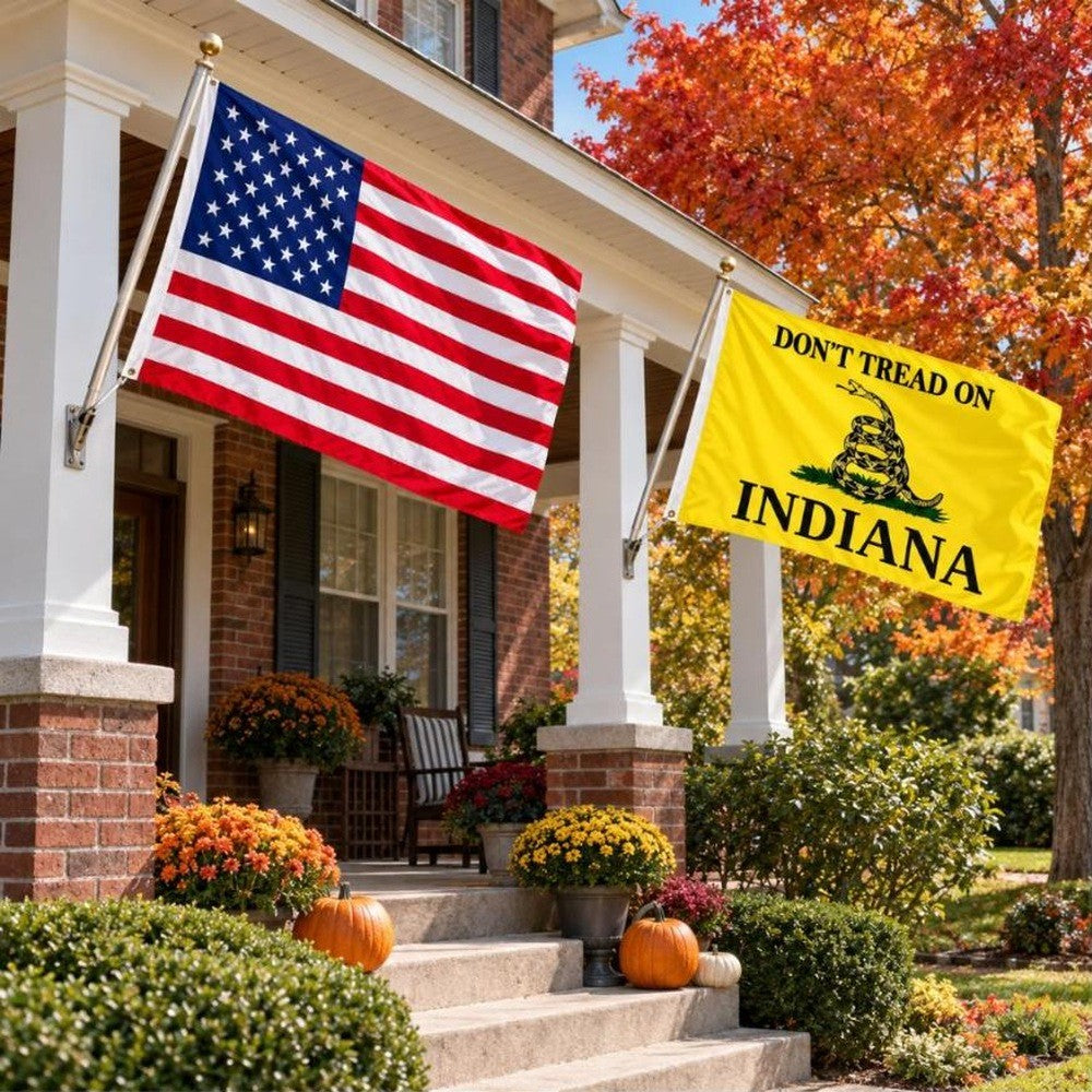 American flag and Don't Tread on Indiana flag flying side by side outdoors