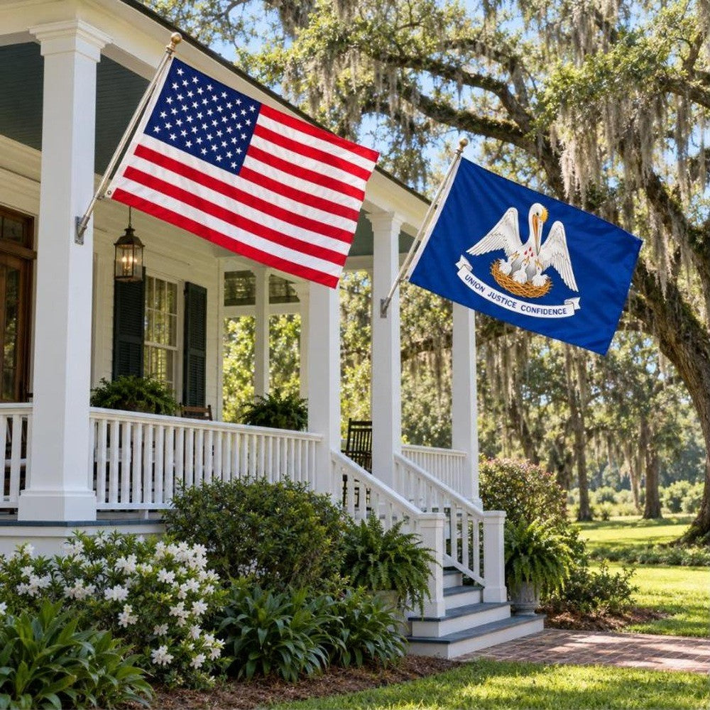 American flag and Louisiana State Flag flying side by side outdoors