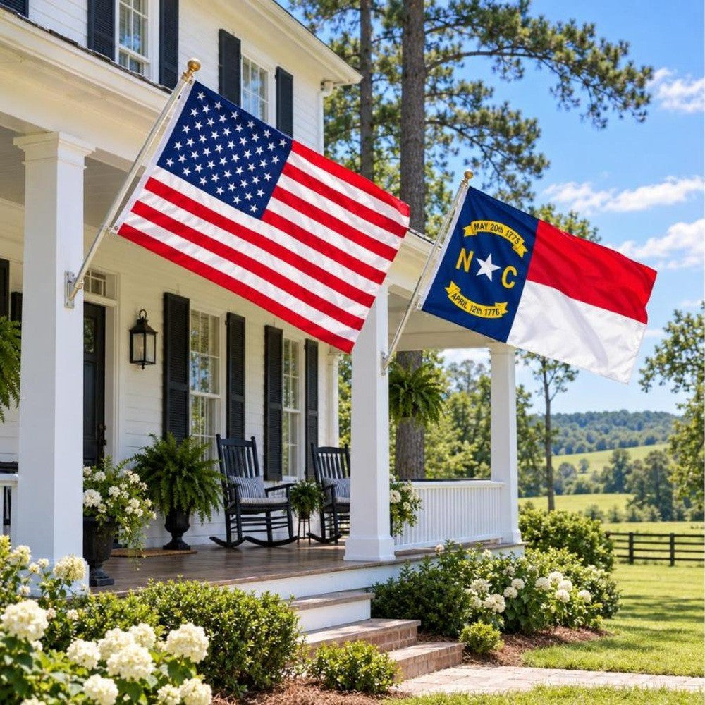 American flag and North Carolina State Flag flying side by side outdoors