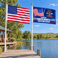 American flag and Proud North Dakota Republican flag flying side by side outdoors