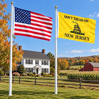 American flag and Don't Tread on New Jersey flag flying side by side outdoors
