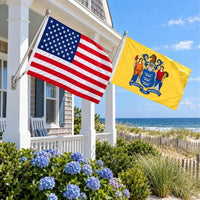 American flag and New Jersey State Flag flying side by side outdoors