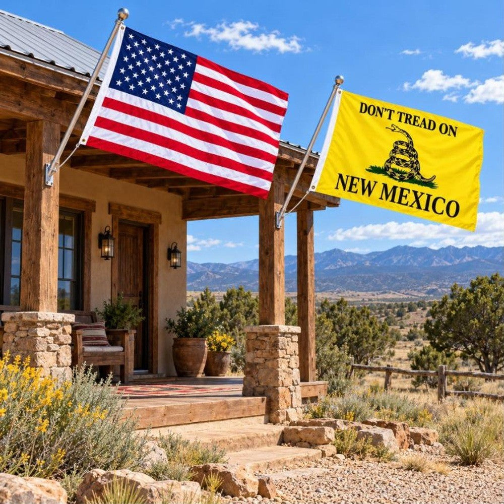 American flag and Don't Tread on New Mexico flag flying side by side outdoors