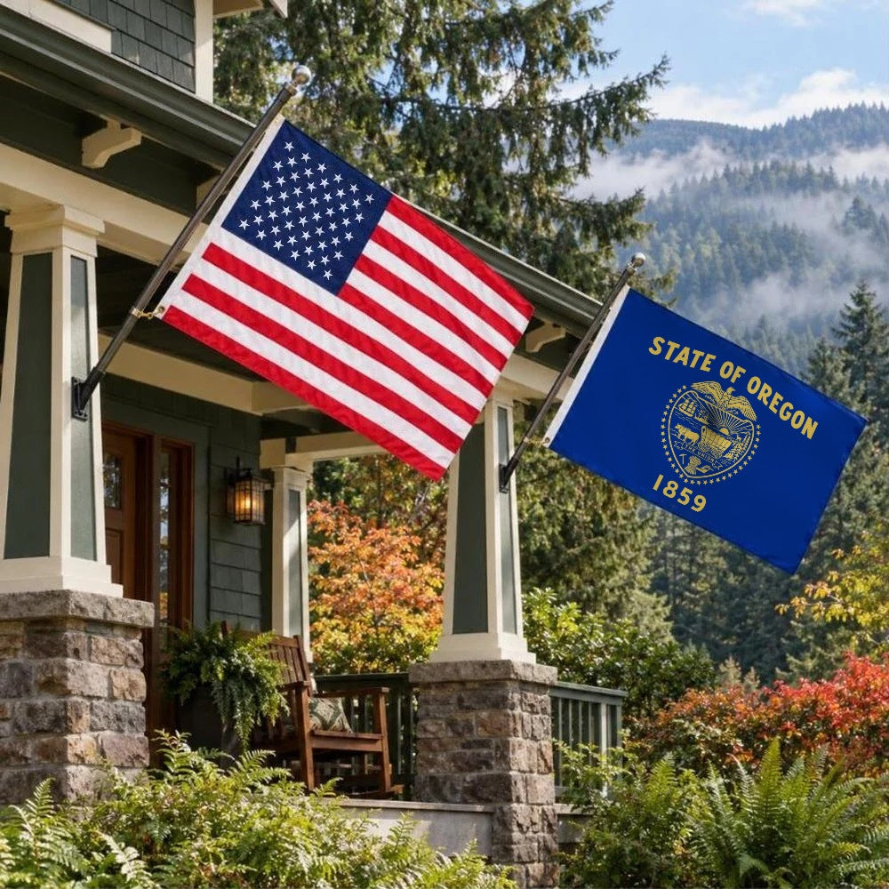 American flag and Oregon State Flag flying side by side outdoors