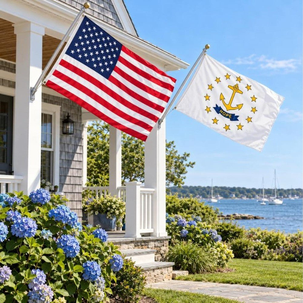 American flag and Rhode Island State Flag flying side by side outdoors