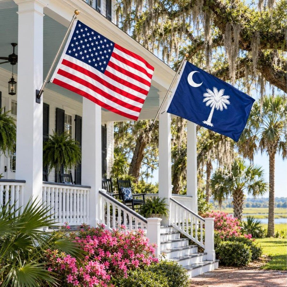 American flag and South Carolina State Flag flying side by side outdoors