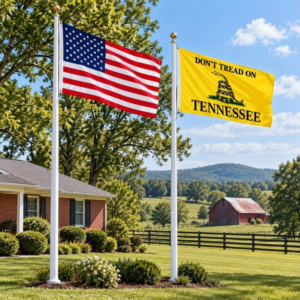 American flag and Don't Tread on Tennessee flag flying side by side outdoors