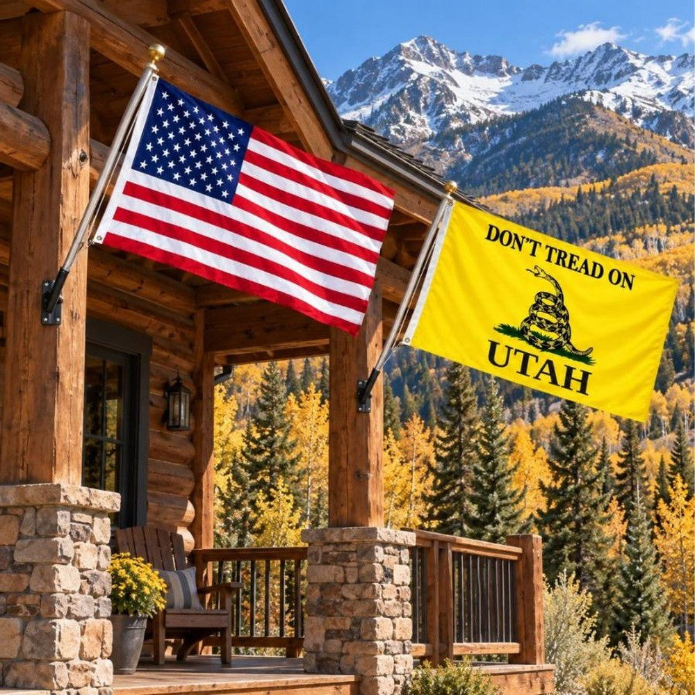 American flag and Don't Tread on Utah flag flying side by side outdoors