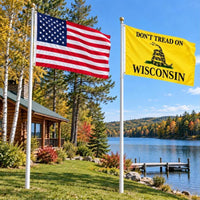 American flag and Don't Tread on Wisconsin flag flying side by side outdoors