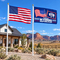 American flag and Proud Wyoming Republican flag flying side by side outdoors