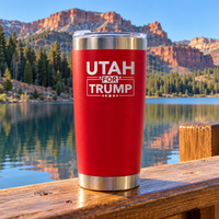 Utah red 20oz tumbler on a dock railing (lifestyle)