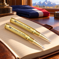 Wyoming bullet pen 2 pack on a leather notebook (lifestyle)