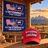 Wyoming hat and two Wyoming flags on a porch at sunset (lifestyle)