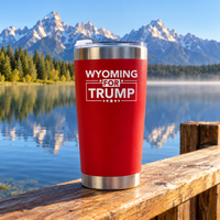 Wyoming red 20oz tumbler on a dock railing (lifestyle)