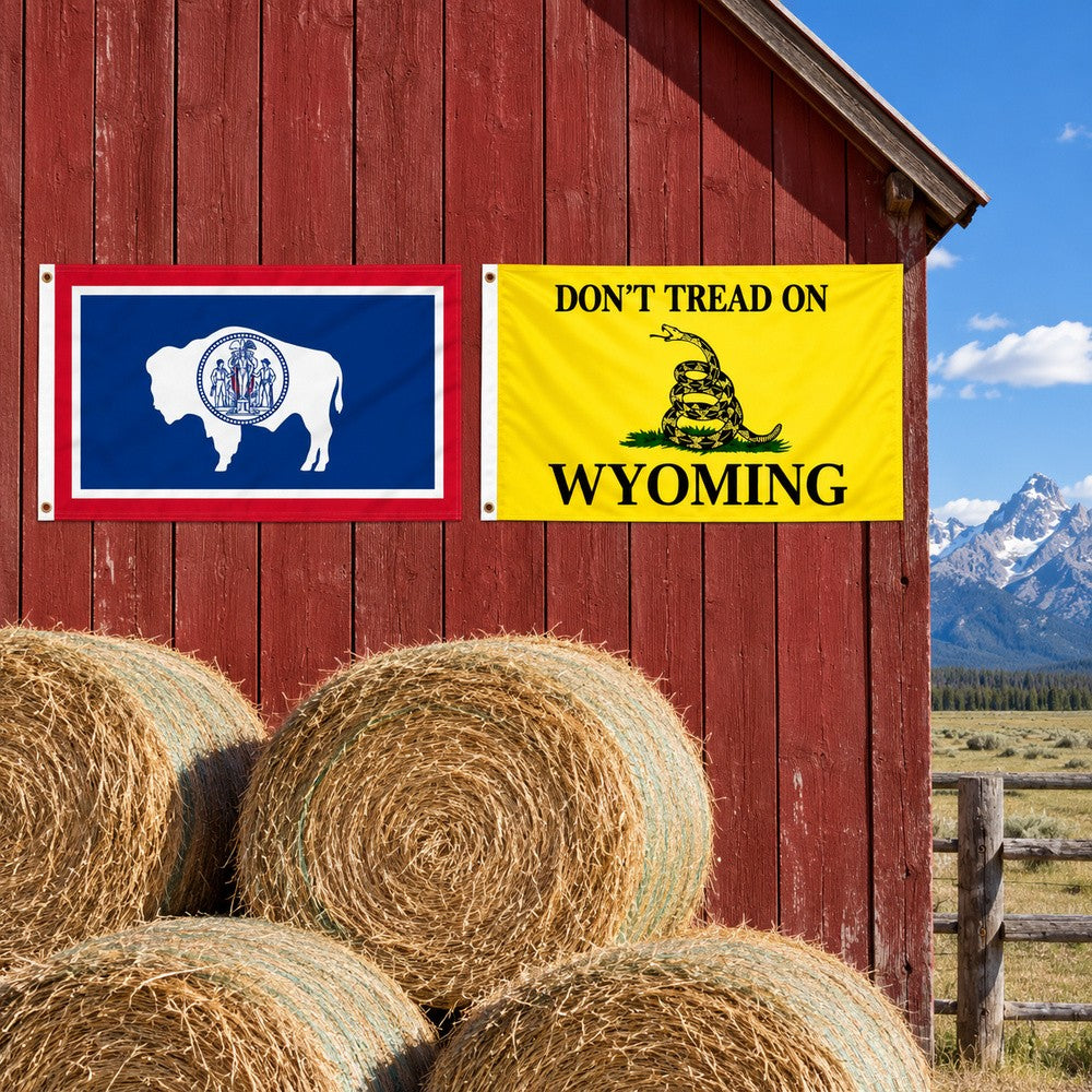 Wyoming State Flag and Don't Tread on Wyoming Flag 3x5 2-Pack displayed outdoors
